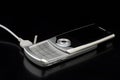 Silver cell phone Royalty Free Stock Photo