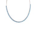 Silver chain with blue stones set in a circle. Jewelry on a white background