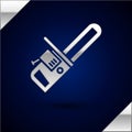 Silver Chainsaw icon isolated on dark blue background. Vector Illustration Royalty Free Stock Photo