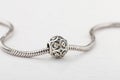 Silver charm bead with ornament for chain bracelet