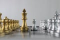 Silver chess pawn is facing golden chess king on white background. Business strategy, market share, business competition,