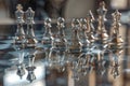 Chess pieces reflected from a shiny mirror board Royalty Free Stock Photo