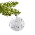 2018 on a silver christmas ball hanging from a branch isolated on white Royalty Free Stock Photo