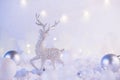 Silver christmas decoration deer and christmas balls on a pink winter background. Christmas holiday mood. Magic and fairy tale Royalty Free Stock Photo