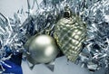 Silver Christmas ornament photo. Christmas tree toy ball and pine cone Royalty Free Stock Photo