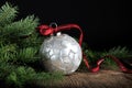 Silver Christmas Ornament with Red Ribbon Royalty Free Stock Photo