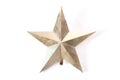 A silver Christmas tree star topper bauble decoration piece white backdrop