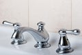 Silver chrome bathroom tap faucets moden style Royalty Free Stock Photo
