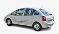 Silver Citroen Xsara Picasso minivan parked on white background Royalty Free Stock Photo