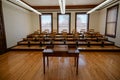 Original classroom riser seating  from 1917 in Fleming Hall, Western New Mexico University, Silver City, New Mexico Royalty Free Stock Photo