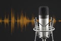 Silver colored condenser microphone on waveform background