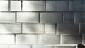 Silver coloured bricks