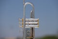 Silver coloured trumpet in the open air. october 1st international day of music