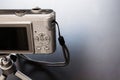 Silver compact digital photo camera. Royalty Free Stock Photo