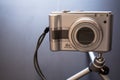 Silver compact digital photo camera. Royalty Free Stock Photo