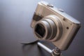 Silver compact digital photo camera. Royalty Free Stock Photo