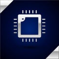 Silver Computer processor with microcircuits CPU icon isolated on dark blue background. Chip or cpu with circuit board Royalty Free Stock Photo