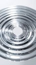 Silver Concentric Circles with Reflections and Shadows on a White Background Royalty Free Stock Photo