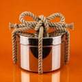 Silver container with rope decoration Royalty Free Stock Photo
