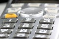 Silver cordless phone keypad closeup