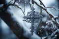 Silver cross hanging on snow covered branch serene and symbolic, palm sunday greetings image