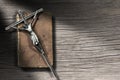 Silver Crucifix and Holy Bible on Wooden Background Royalty Free Stock Photo