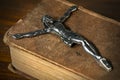 Silver Crucifix on a Old Holy Bible Royalty Free Stock Photo