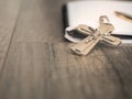 The silver crucifix and a pen on the a blank note book,christian concept Royalty Free Stock Photo