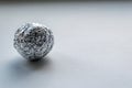 Silver crumpled aluminum foil ball Royalty Free Stock Photo