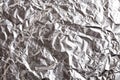 Silver crumpled foil shiny metal texture background wrapping paper for wallpaper decoration element Royalty Free Stock Photo