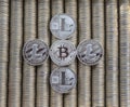 Silver Crypto coins bitcoin BTC Litecoin LTC. Metal coins are laid out in a smooth background to each other, close-up view from to Royalty Free Stock Photo