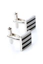 Silver cuff links on white background Royalty Free Stock Photo