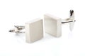 Silver cuff links on white background Royalty Free Stock Photo