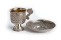 Silver cup and saucer