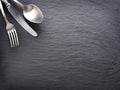 Silver cutlery on a dark background. Royalty Free Stock Photo