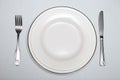 Silver cutlery, plate on the table Royalty Free Stock Photo