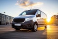 Silver delivery van on parking in front of the warehouse at distribution center Royalty Free Stock Photo