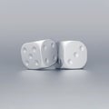 Silver dice on on grey background. Lucky game or random concept Royalty Free Stock Photo