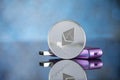 Silver digital cruptocurrency coin ethereum with hardware wallet