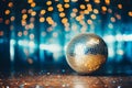 Silver disco ball on sparkling festive background with copy space for festive celebration concept Royalty Free Stock Photo