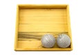 Silver disco ball in wooden box isolate on white background. Royalty Free Stock Photo