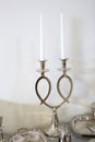 Silver dishware, candle holder