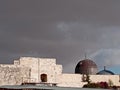 Silver dome on a grey sky background