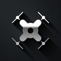 Silver Drone flying icon on black background. Quadrocopter with video and photo camera symbol. Long shadow