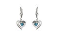 Silver earrings in the shape of heart Royalty Free Stock Photo