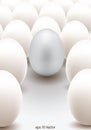 Silver egg standing out from the others Royalty Free Stock Photo