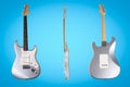 Silver electric guitar isolated on blue background.. Royalty Free Stock Photo