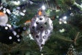 A silver embedded crystal ornament hanging on the Christmas tree Royalty Free Stock Photo