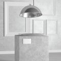 Silver Empty Restaurant Cloche over Pedestal, Stage, Podium or Column in Art Gallery or Museum. 3d Rendering