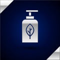 Silver Essential oil bottle icon isolated on dark blue background. Organic aromatherapy essence. Skin care serum glass Royalty Free Stock Photo